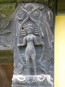 Carving of Eve on the gatehouse