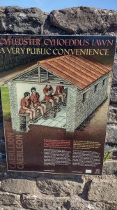 Info board showing an artist's impression of the latrines